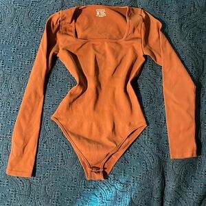 NEVER WORN SQUATE NECK BODY SUIT